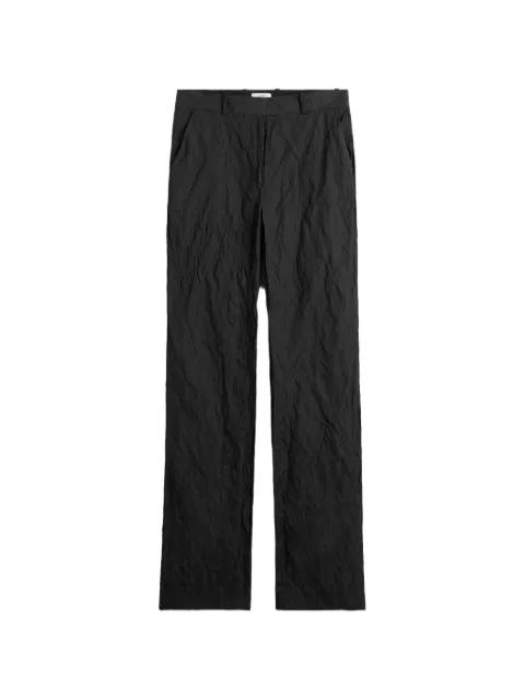 crinkled-effect trousers by TOTEME