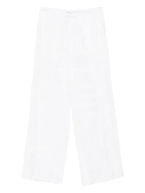 monogram crochet trousers by TOTEME
