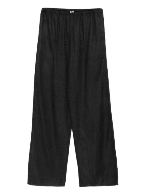monogram flannel trousers by TOTEME