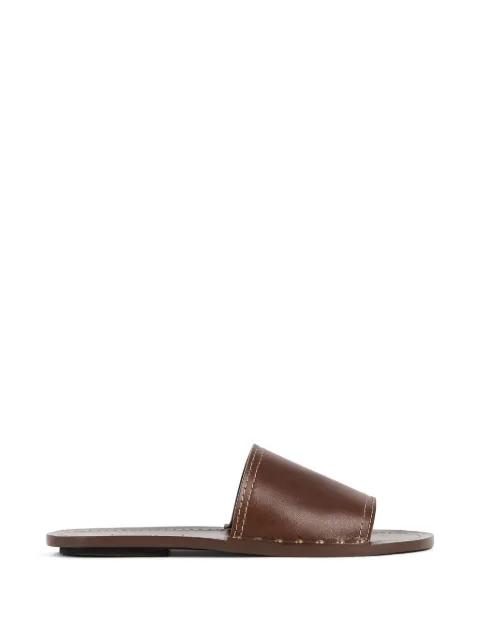 studded leather slides by TOTEME