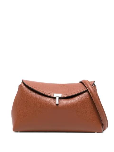 tuck-lock fastening grained-leather clutch bag by TOTEME