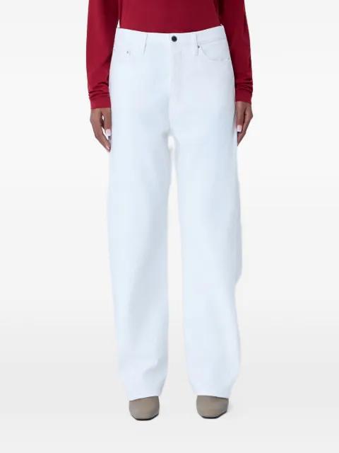twisted-seam straight-leg jeans by TOTEME