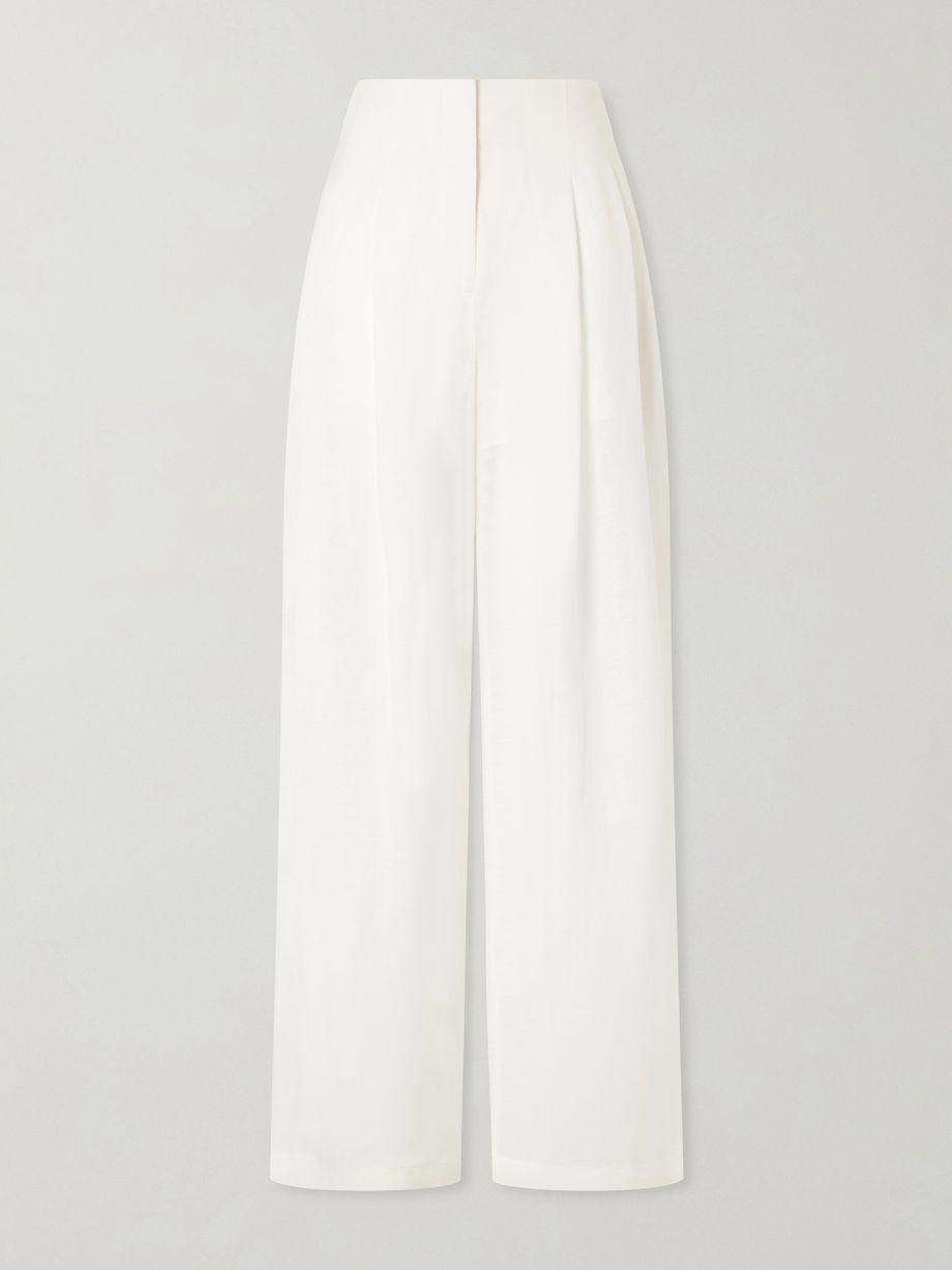 Carries linen and silk-blend wide-leg pants by TWP