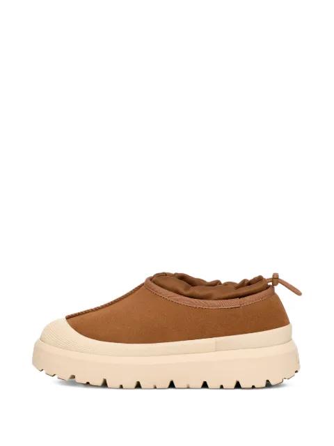 thick sole adjustable sneakers by UGG