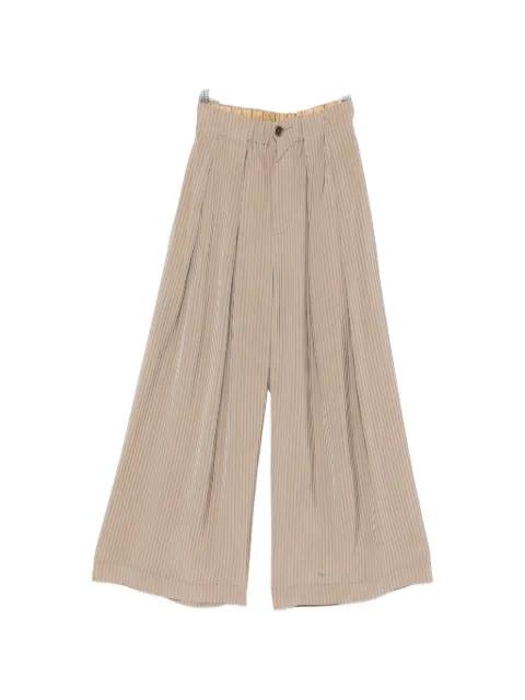 Poetic pleated trousers by UMA WANG
