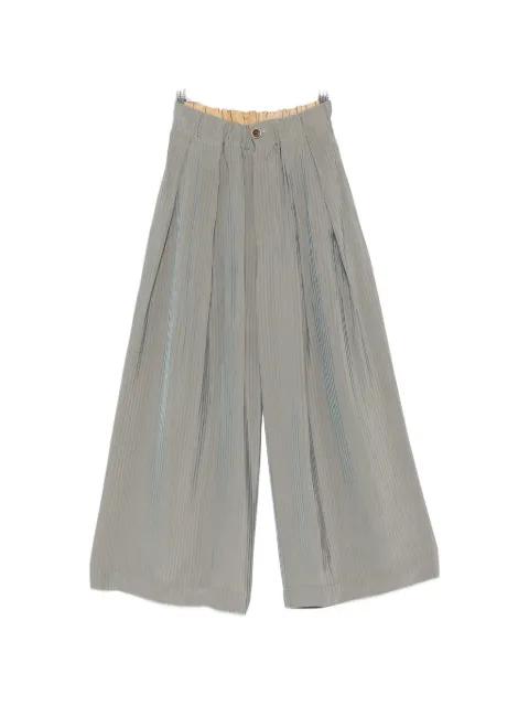 Poetic pleated trousers by UMA WANG