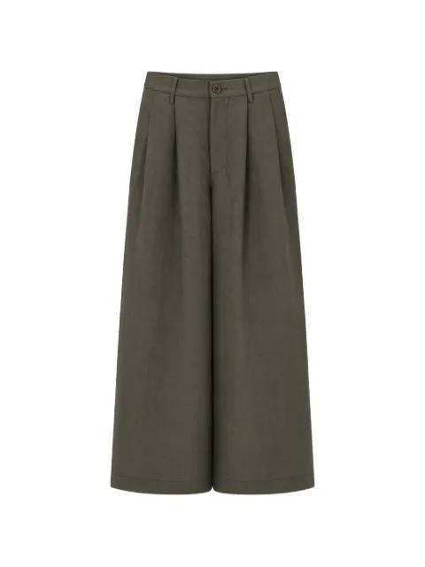button-fastening trousers by UMA WANG