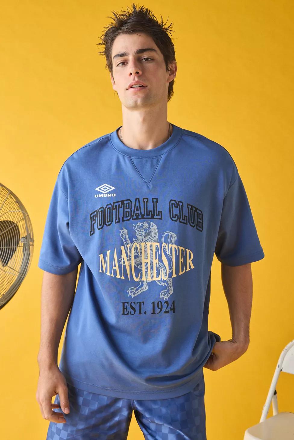 Umbro UO Exclusive Manchester Football Club Graphic Tee by UMBRO