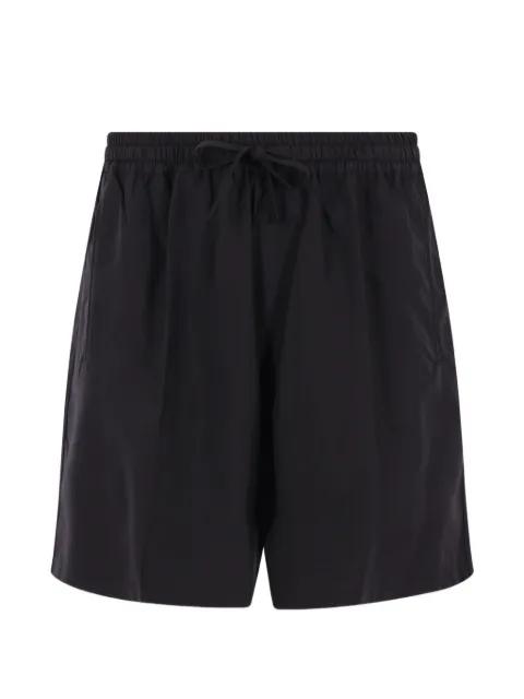 drawstring pocketed deck shorts by UMIT BENAN