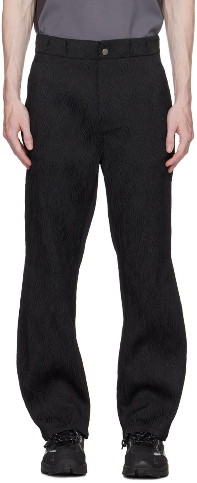 Black Lineman Trousers by UNCERTAIN FACTOR