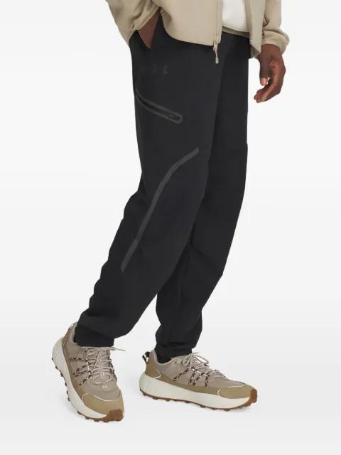 Unstoppable cargo-pocket track pants by UNDER ARMOUR