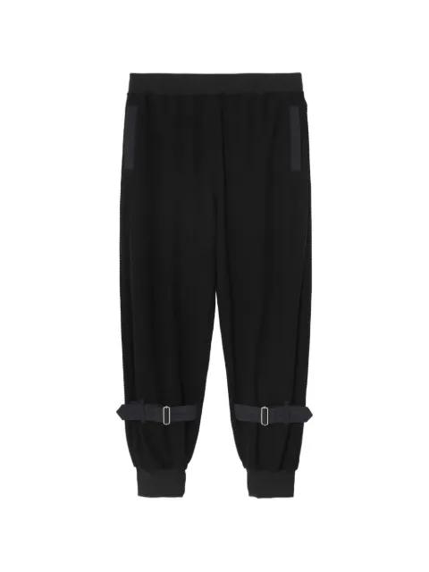 buckle-detail track pants by UNDERCOVER