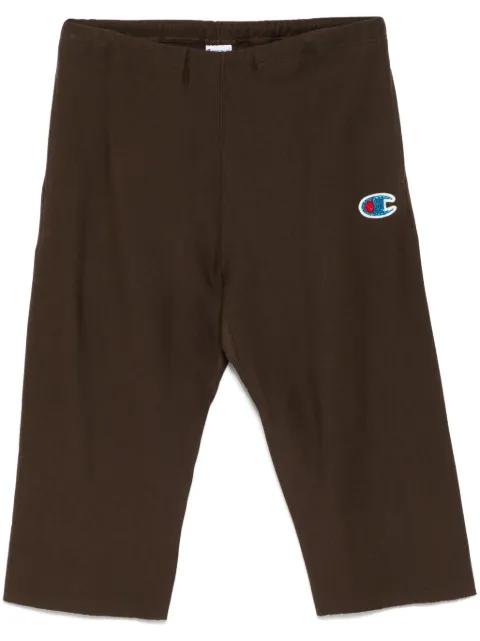 logo patch trousers by UNDERCOVER