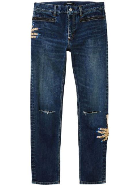 motif-embroidered straight-leg jeans by UNDERCOVER