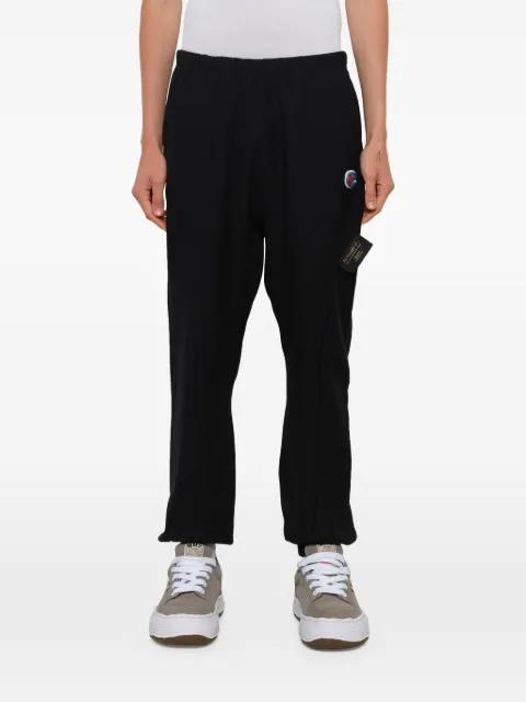 x Champion logo-patch track pants by UNDERCOVER