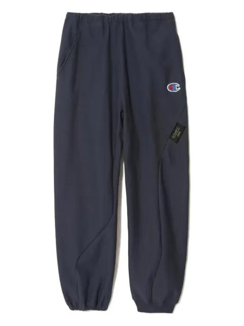 x Champion logo-patch track pants by UNDERCOVER