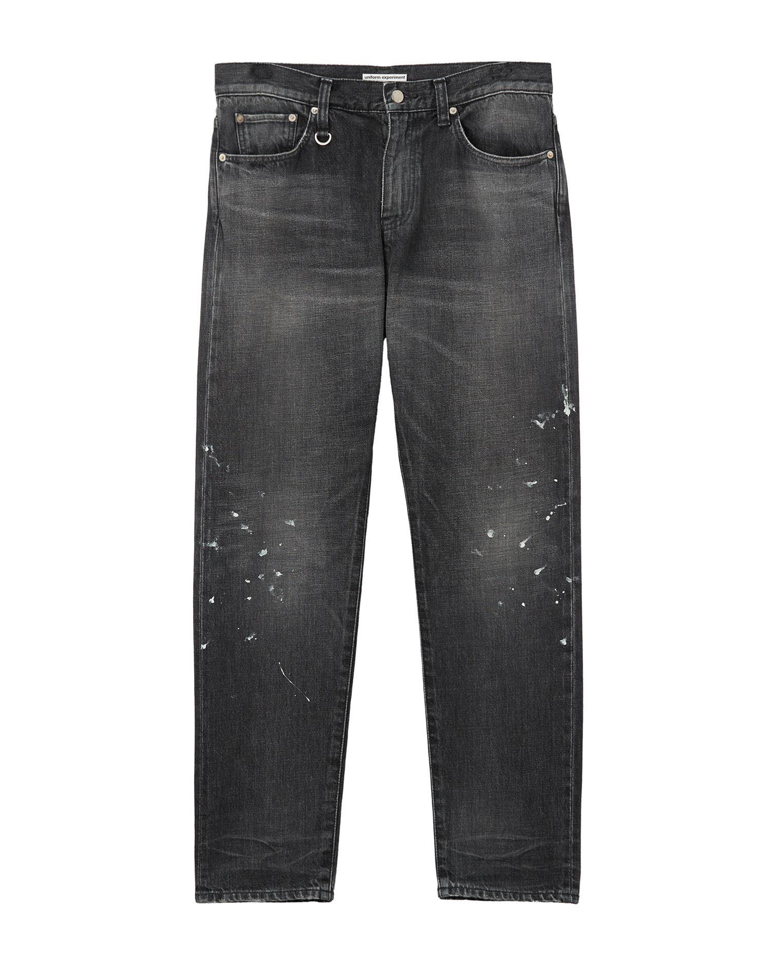 Damaged tapered fit jeans by UNIFORM EXPERIMENT
