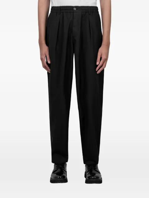 pleated trousers by UNIVERSAL WORKS