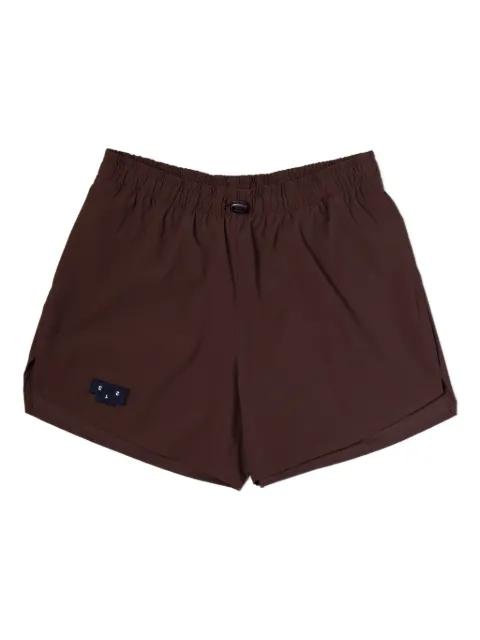 elastic-waistband performance shorts by UNNA