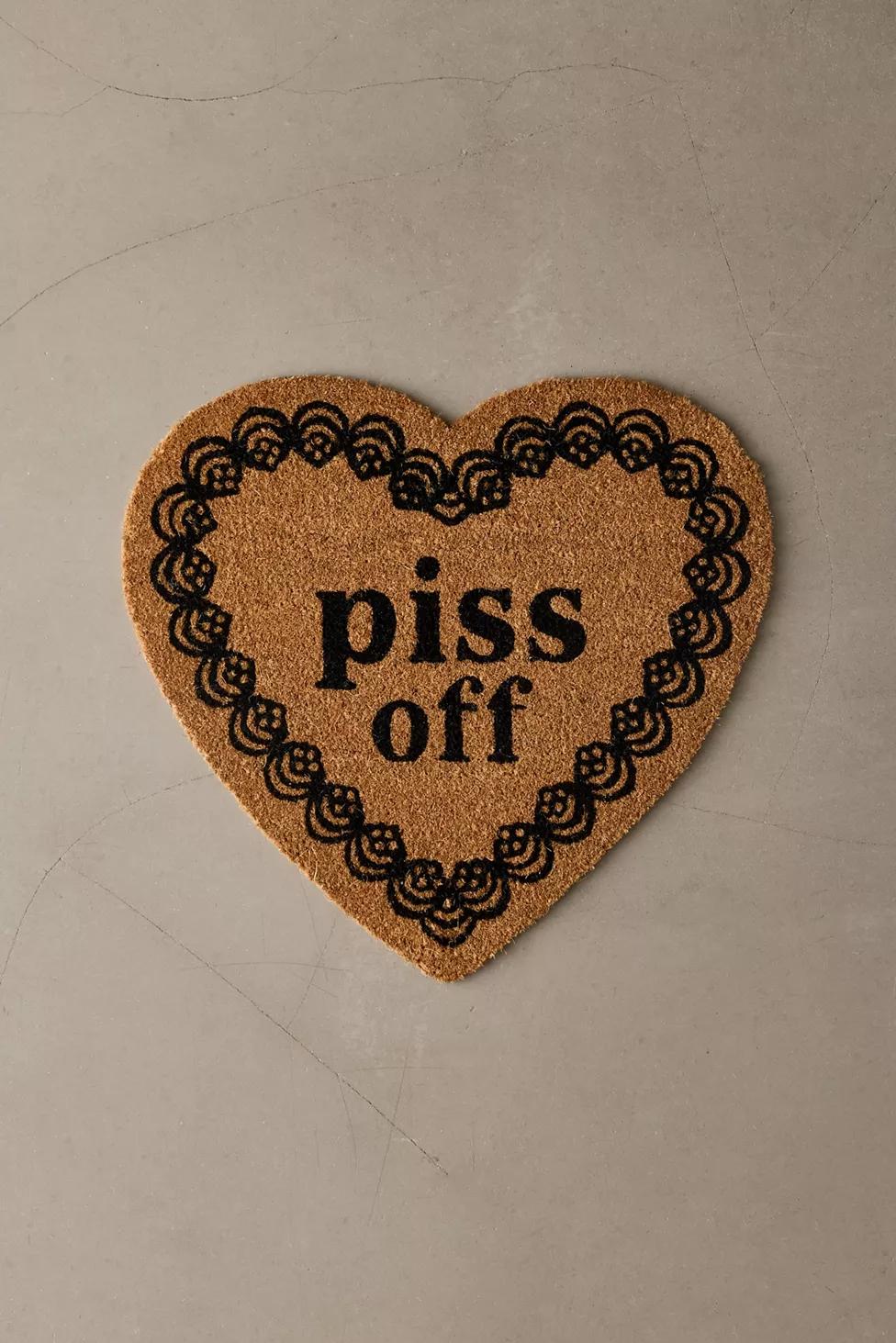 P*** Off Heart Shaped Coir Doormat by URBAN OUTFITTERS