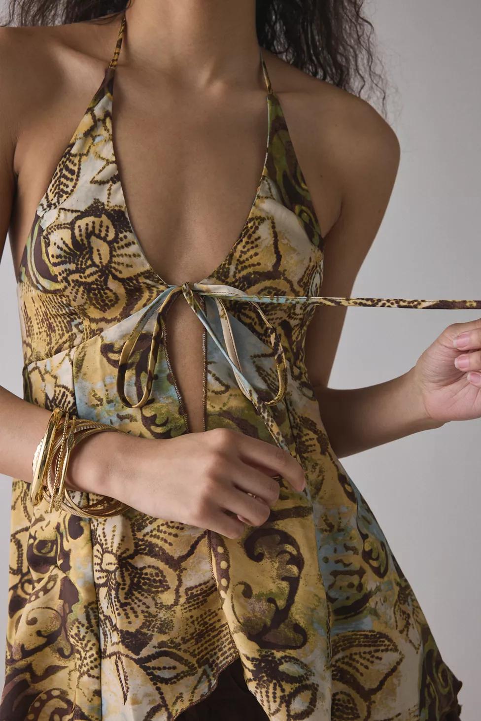 UO Catie Halter Split-Front Flyaway Tunic Top by URBAN OUTFITTERS UO Catie Halter Split-Front Flyaway Tunic Top by URBAN OUTFITTERS