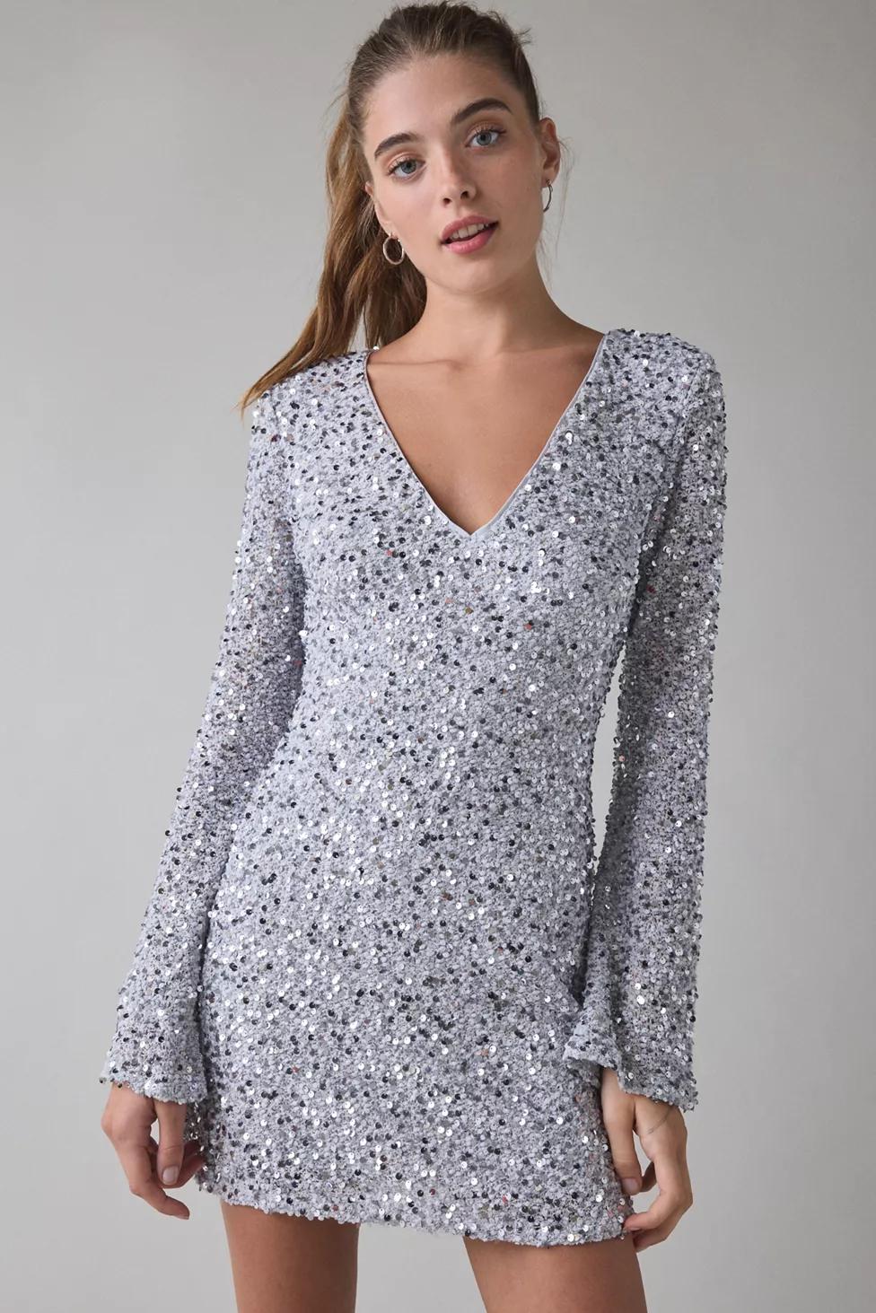 UO That’s Showbiz Open Back Bell Sleeve Sequin Mini Dress by URBAN OUTFITTERS