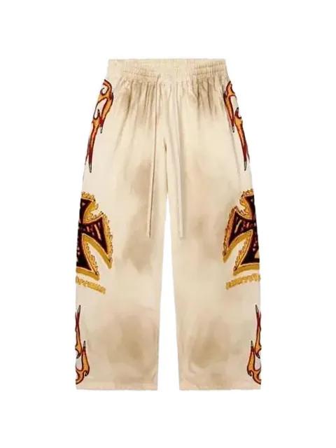 LA Flare printed track pants by VALE