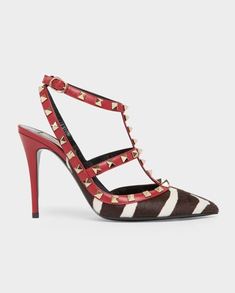 100mm Rockstud Zebra Calf Hair Ankle-Strap Pumps by VALENTINO