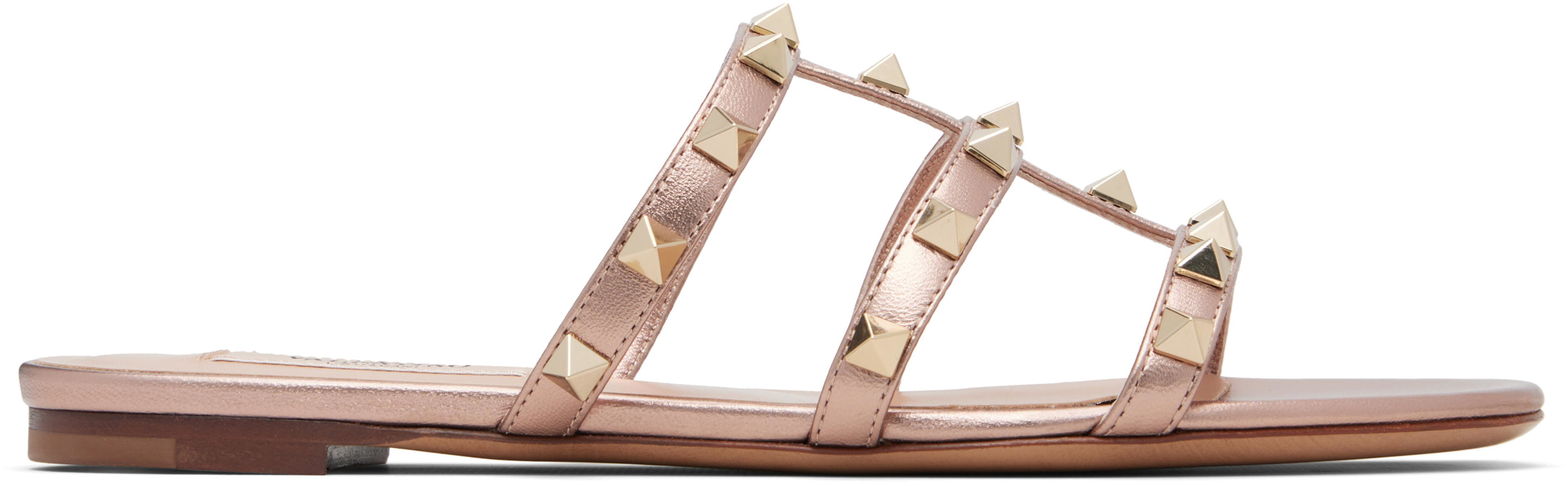 Pink Rockstud Flat Slide Sandals by VALENTINO