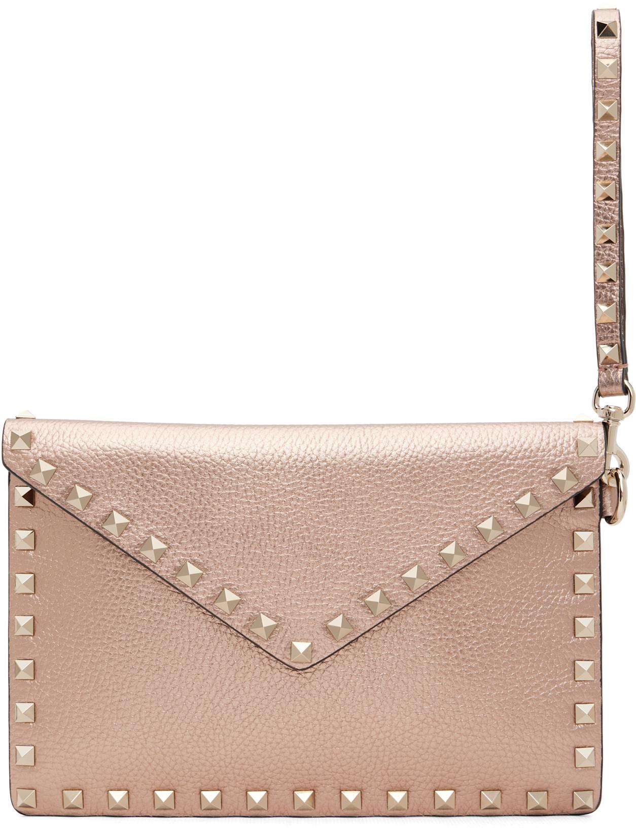 Pink Rockstud Laminated Pouch by VALENTINO