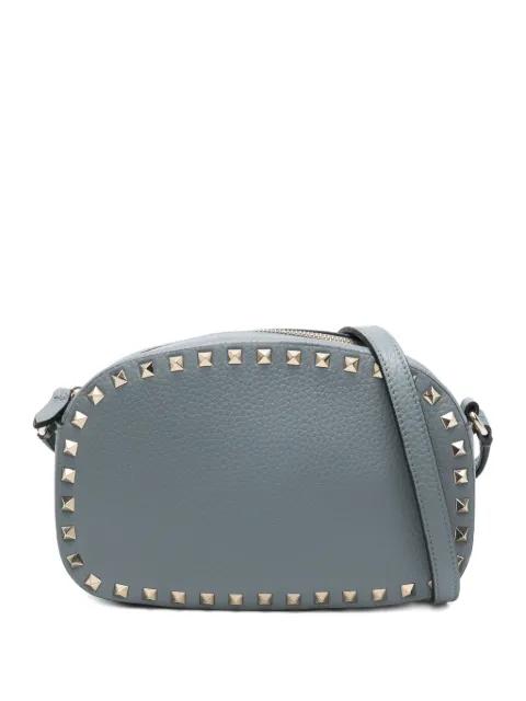 Rockstud-embellished cross body bag by VALENTINO