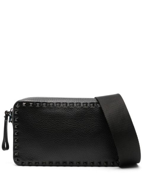 Rockstud-embellished messenger bag by VALENTINO