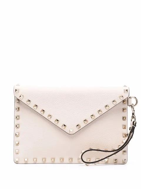 Rockstud envelope clutch by VALENTINO