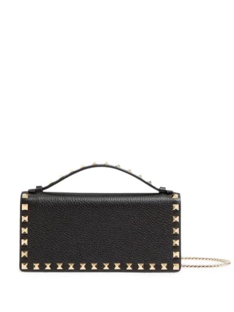 Rockstud grained-leather cross body bag by VALENTINO