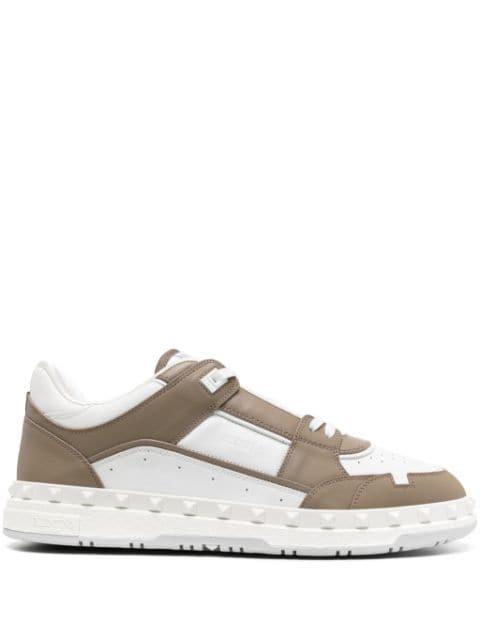 Rockstud lace-up sneakers by VALENTINO