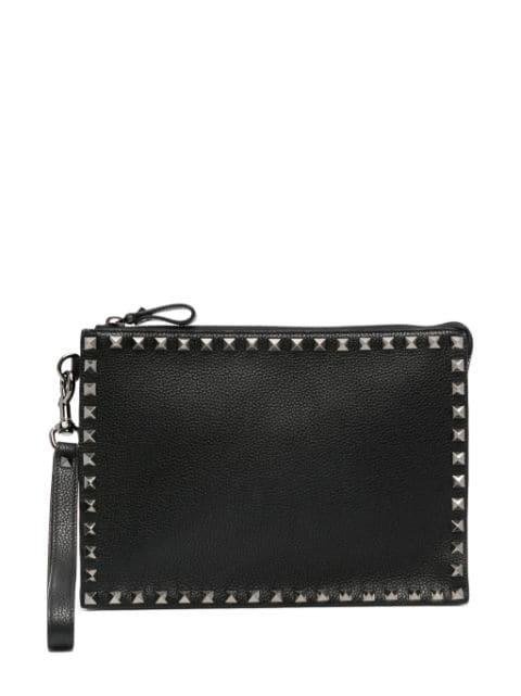 Rockstud leather clutch bag by VALENTINO