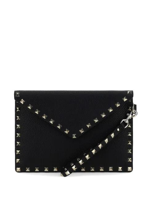Rockstud leather clutch bag by VALENTINO