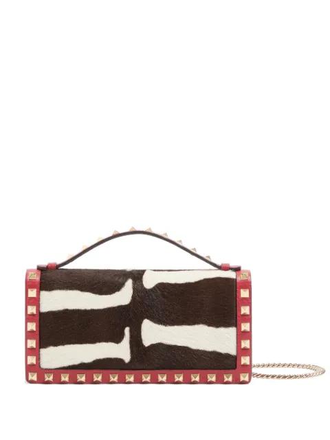 Rockstud wallet with chain in pony-effect calfskin by VALENTINO