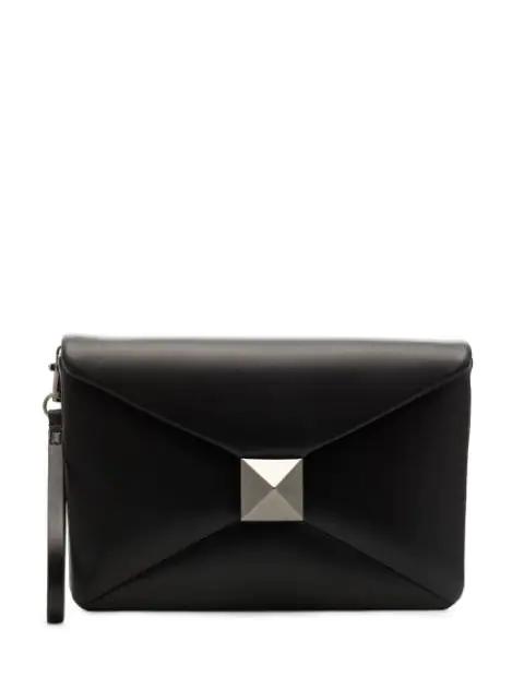 Roman stud leather clutch bag by VALENTINO
