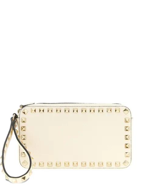 Ruckstud wrist-strap clutch bag by VALENTINO