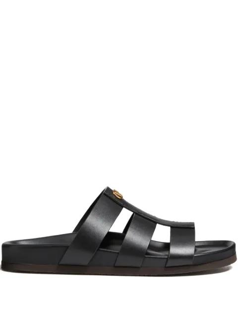 Studshield leather sandals by VALENTINO