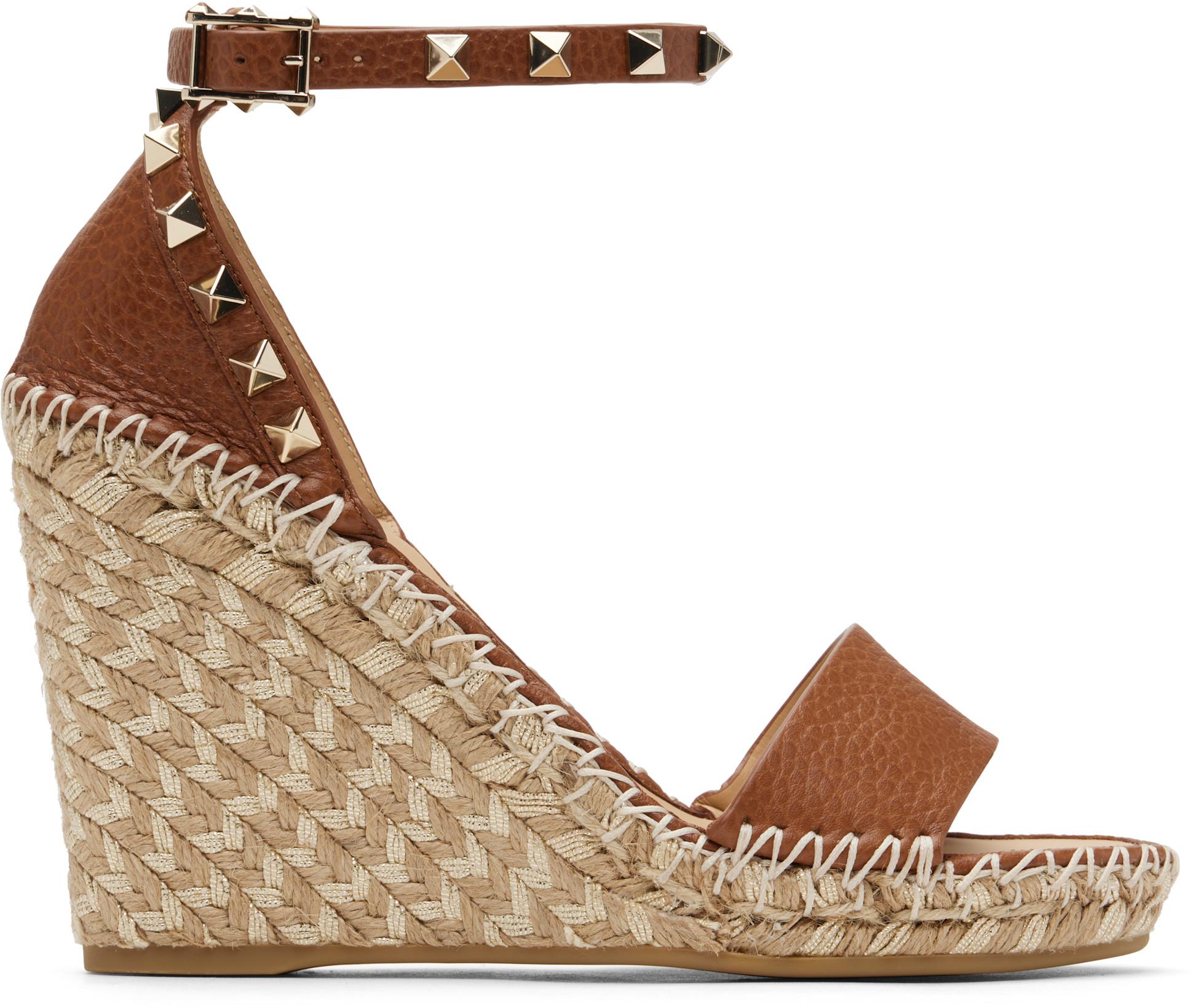 Tan Double Rockstud Grainy Calfskin Wedge Sandals by VALENTINO