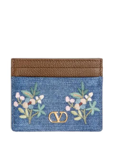 VLogo Signature card holder in denim with floral embroidery by VALENTINO