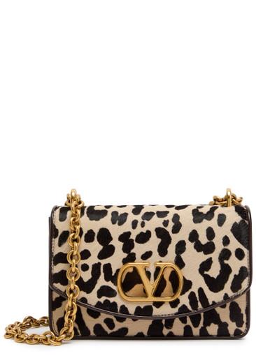 Vain small cow-print leather and calf-hair shoulder bag by VALENTINO