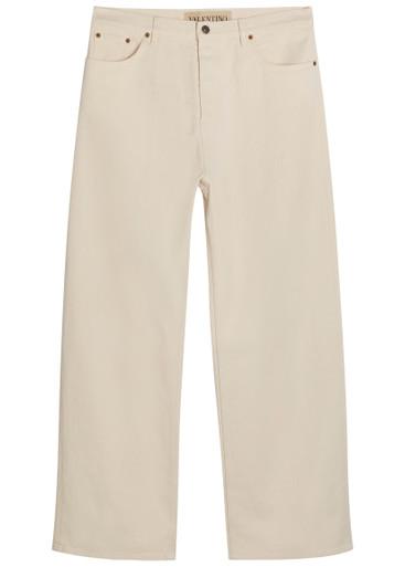 Wide-leg denim jeans by VALENTINO