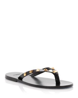 Women's Rockstud Thong Sandals by VALENTINO