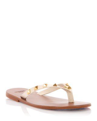 Women's Rockstud Thong Sandals by VALENTINO