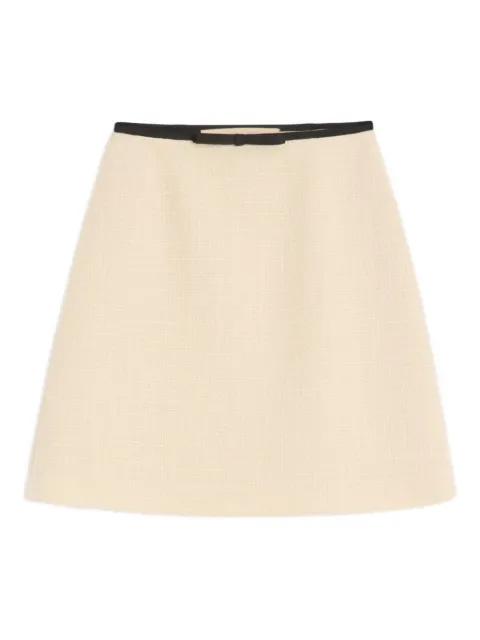 bow-detail tweed mini skirt by VALENTINO