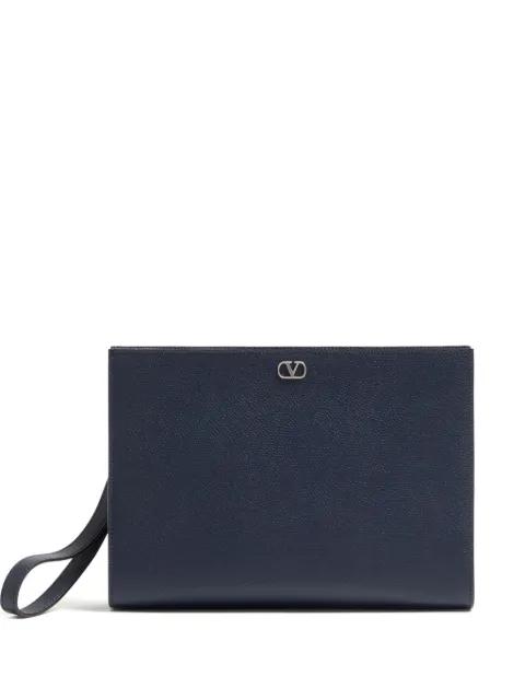 grained Vlogo signature leather clutch bag by VALENTINO
