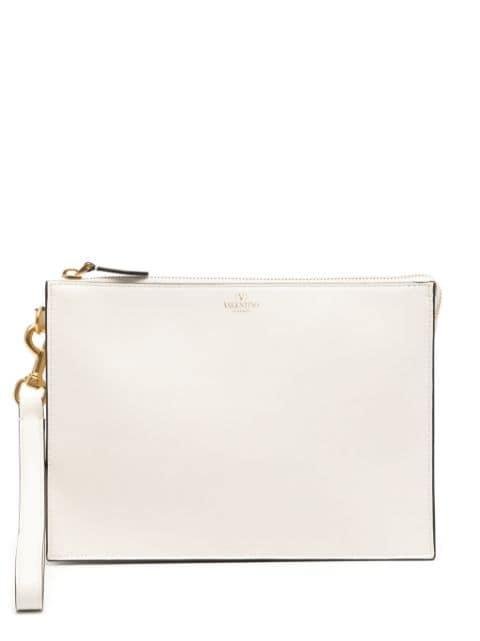 logo-stamp leather clutch bag by VALENTINO